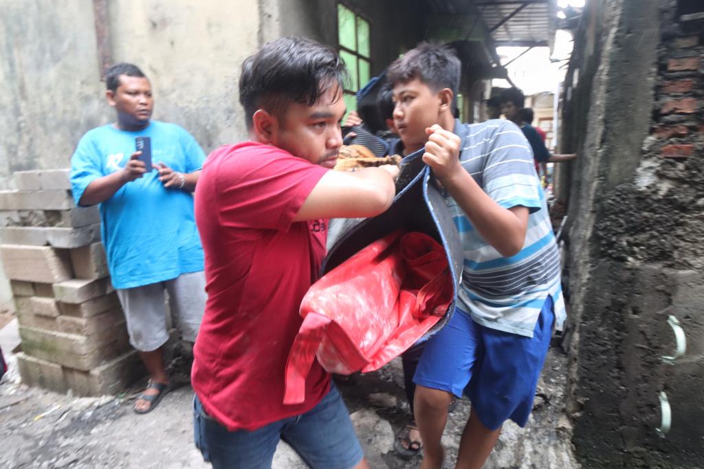 Korban Kebakaran Pemukiman Padat Tanah Merah