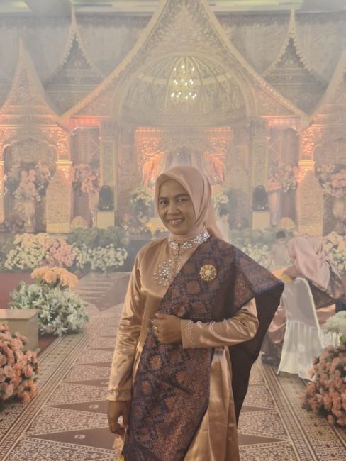 Hj Umi Haniah, S.Pd., M.Pd